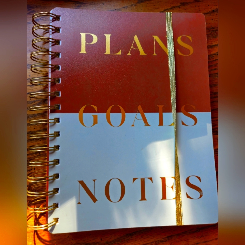 Gold and White Spiral Notebook